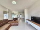 Spacious living room with modern furniture and an open layout