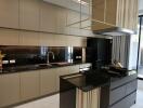 Modern kitchen with stainless steel appliances and elegant cabinetry