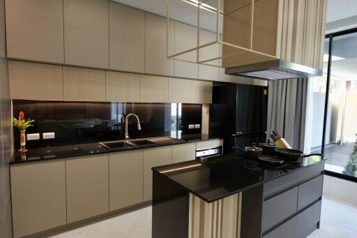 Modern kitchen with stainless steel appliances and elegant cabinetry