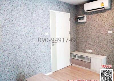 Modern bedroom with air conditioning and decorative wallpaper