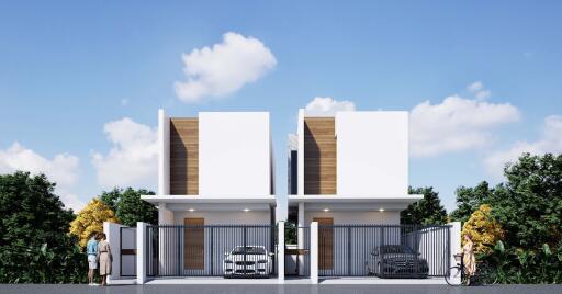 Modern duplex house with front yard, parking space, and clear skies