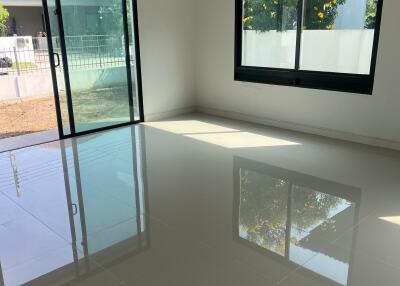 Modern building interior with polished tile flooring and large windows