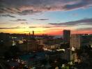 City skyline at sunset with buildings