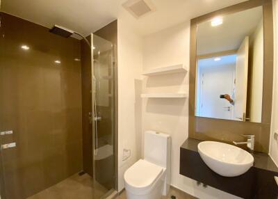 Modern bathroom with shower and elegant basin