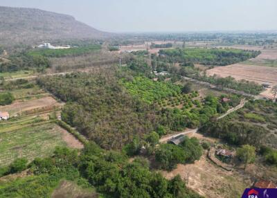 Aerial view of a green rural landscape with potential for real estate development