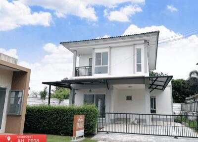 Modern two-story family home with balcony and landscaped front yard