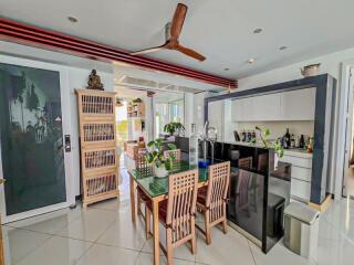 Spacious kitchen with modern appliances and dining area