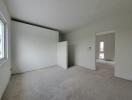 Spacious unfurnished bedroom with natural light