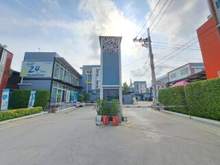 Modern commercial building exterior with a clear sky