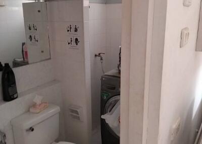 Compact bathroom with toilet and shower