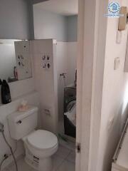 Compact bathroom with toilet and shower