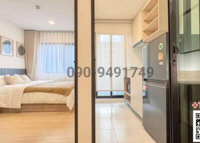 Compact studio apartment with combined bedroom and kitchen area