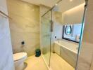 Modern bathroom with glass shower and tub