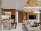 Modern open plan living area with integrated kitchen, featuring elegant design and luxurious finishes