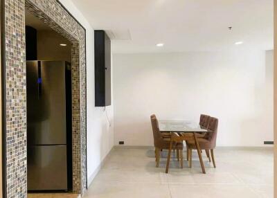 Modern kitchen with dining area and appliances