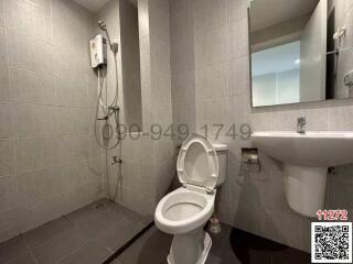 Modern bathroom interior with toilet, shower and sink