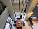 Spacious high-ceiling living room overlooking the outside area