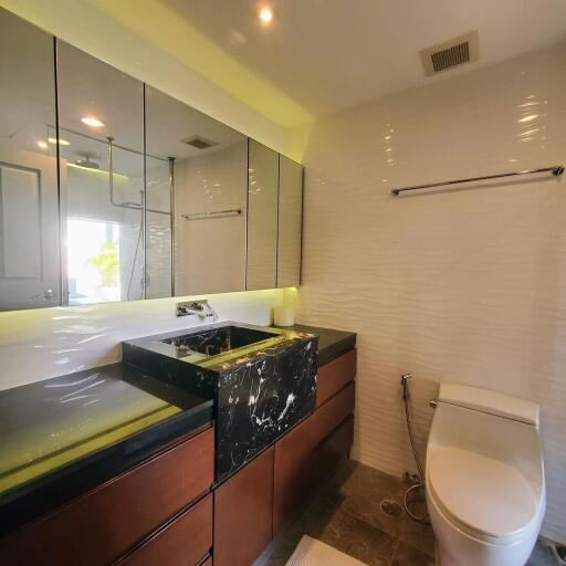 Modern bathroom with spacious vanity and glass shower