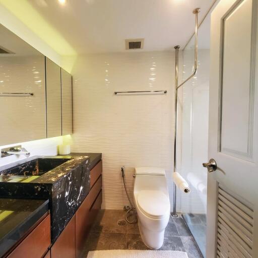 Modern bathroom interior with marble sink and tiled walls