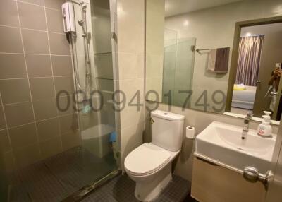 Modern bathroom with spacious glass-enclosed shower area