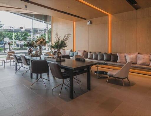 Modern dining area with ample seating and natural light