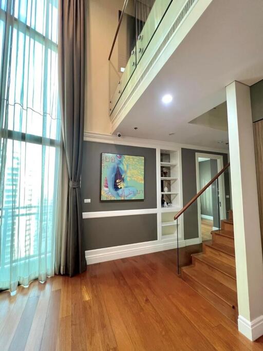 Spacious double-height living room with natural light