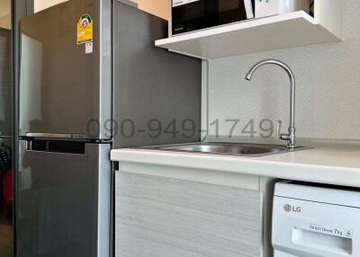 Compact modern kitchen with appliances