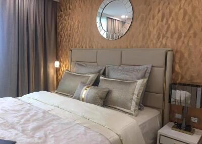 Elegantly designed bedroom with neutral tones and modern decor