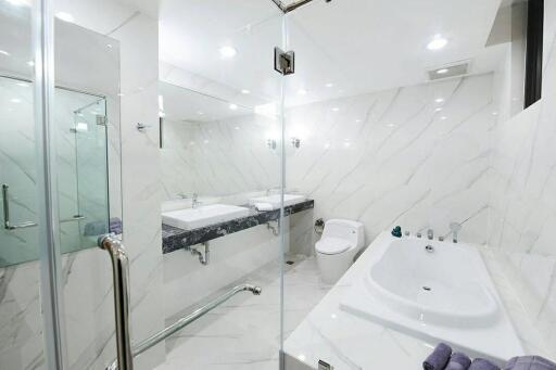 Modern bathroom with marbled tiles