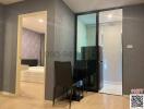 Modern bedroom with mirrored wardrobe and work desk space