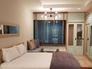 Cozy bedroom with modern interior design, including a large bed, ambient lighting, and wooden wardrobe