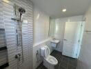 Modern bathroom with walk-in shower and white tiles