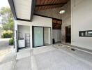 Spacious and modern carport with wooden ceiling design