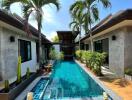 Luxurious private villa with a swimming pool and tropical garden