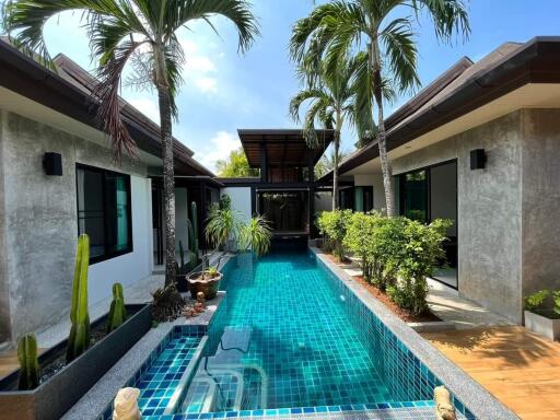 Luxurious private villa with a swimming pool and tropical garden