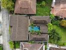 Aerial view of residential property with swimming pool