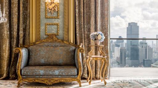 Elegant living room with classic furniture and a view of the city skyline