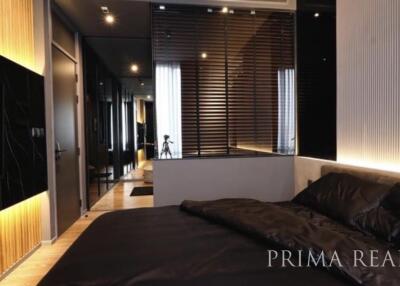 Modern bedroom with stylish interior design, sleek furniture, and ambient lighting