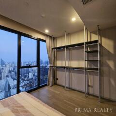 Spacious living room with city view through large window