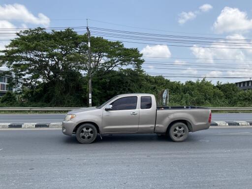 Pickup truck driving on a road