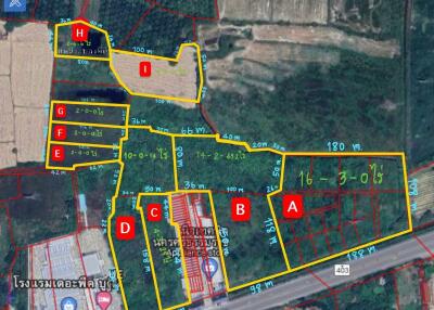 Aerial view of land plots with demarcated boundaries for real estate development