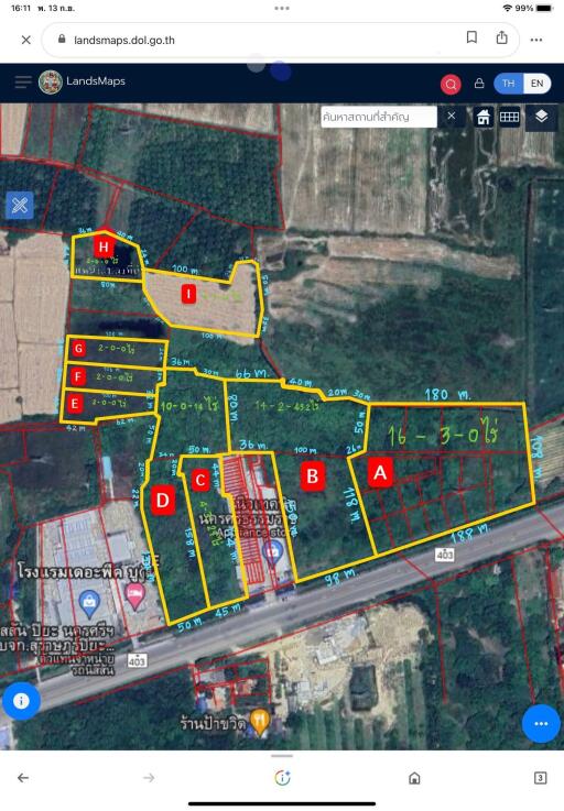 Aerial view of land plots with demarcated boundaries for real estate development