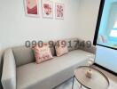 Cozy and modern living room with sofa and decorative items