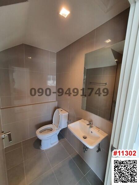 Modern bathroom with tiled walls and flooring