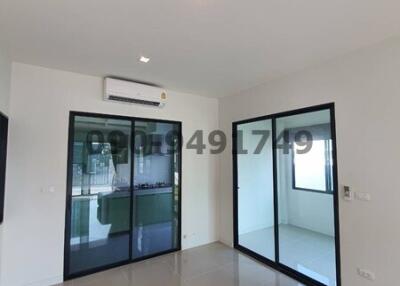 Modern bedroom with sliding glass door and air conditioning unit