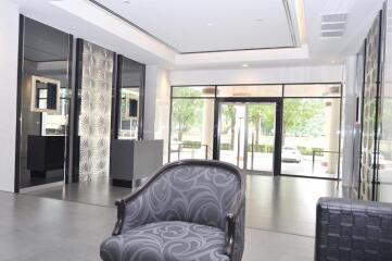 Elegant lobby with modern furniture and decorative wall panels