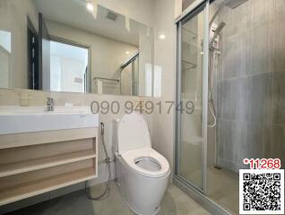 Clean and modern bathroom with shower and vanity