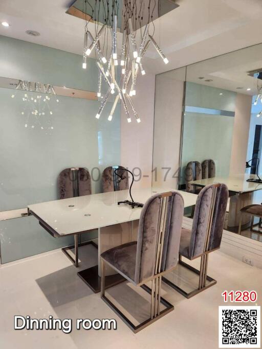 Modern dining room with elegant table and plush chairs