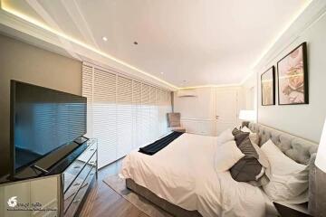 Modern and spacious bedroom with ample lighting