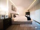 Modern bedroom with a large bed, nightstands, and contemporary decor